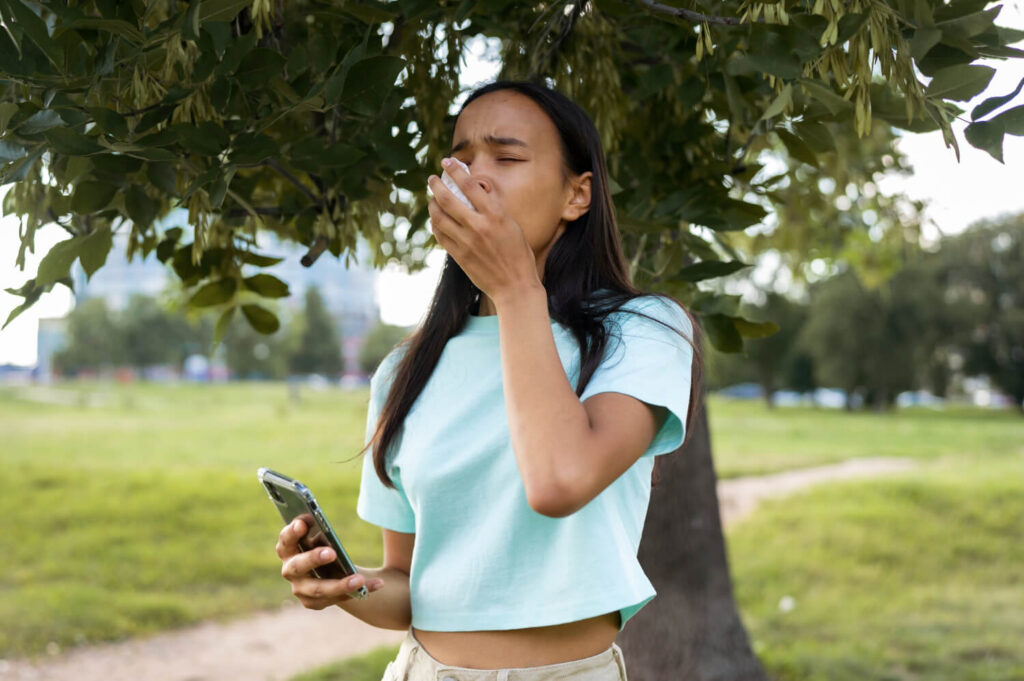 asthmatic woman using inhaler