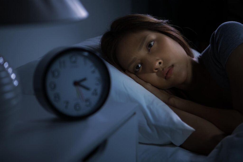 woman with insomnia can't sleep
