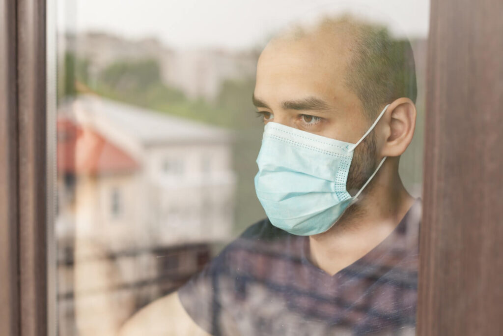 man in quarantine because of COVID-19