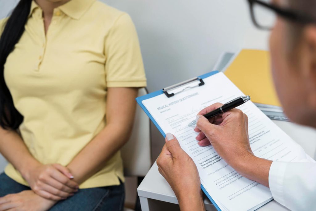 person getting check up for pre-employment medical examination